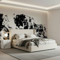 An artistic ink landscape mural on minimalist wallpaper.