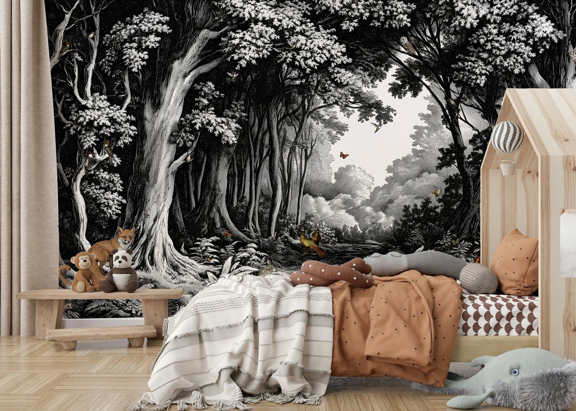 Black and white forest mural with fading tree silhouettes

