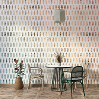 Iridescent oval patterns on a soft white wall mural.

