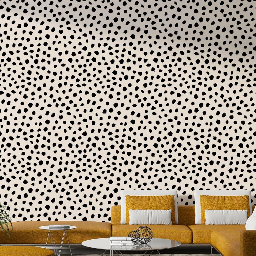 Irregular black spots wallpaper on a living room wall

