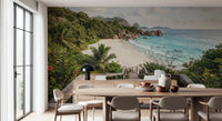dining room with Island Steps wall mural beside small wooden tables and rattan chairs in warm light GD9622