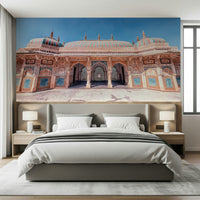 Spacious bedroom featuring Jaipur Jewel Wall Mural and detailed royal archways