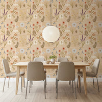 Dining area with Jardin des Fleurs Collage Vintage Wallpaper and a glowing pendant light