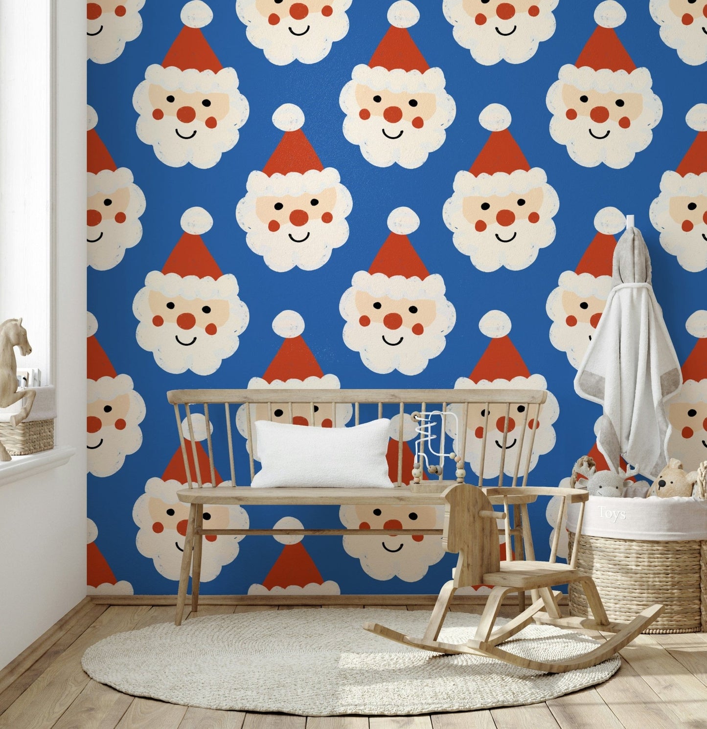 Blue wallpaper for walls covered in charming Father Christmas.