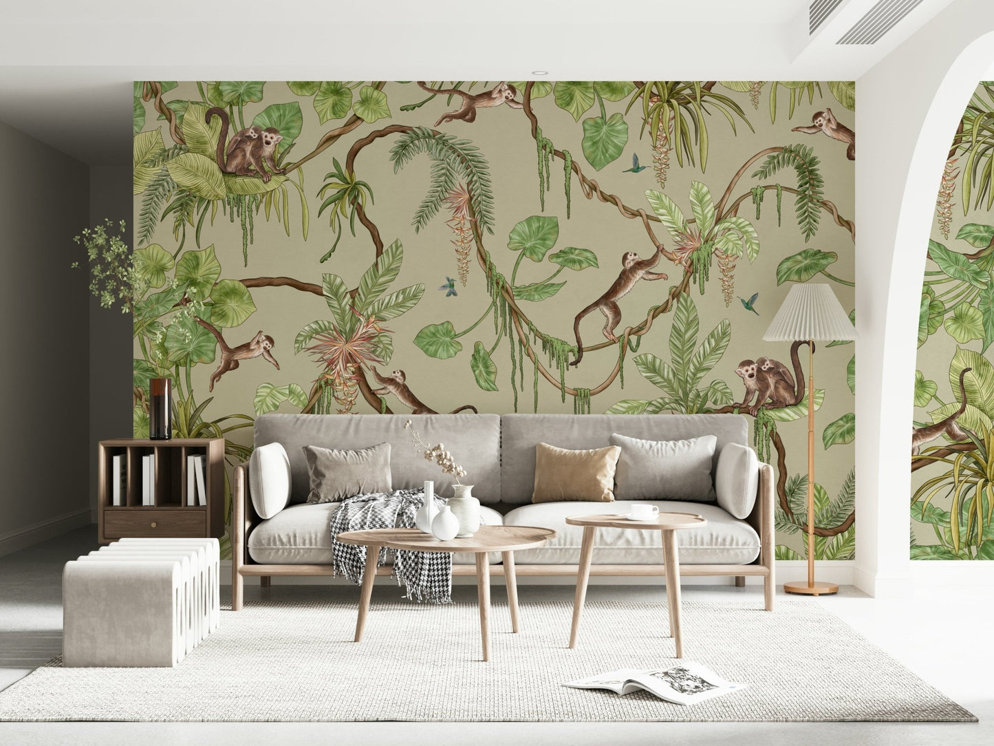 Nursery crib set against the lively jungle wallpaper mural.
