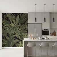 Jungle wall mural featuring deep botanical leaves and shadowed base