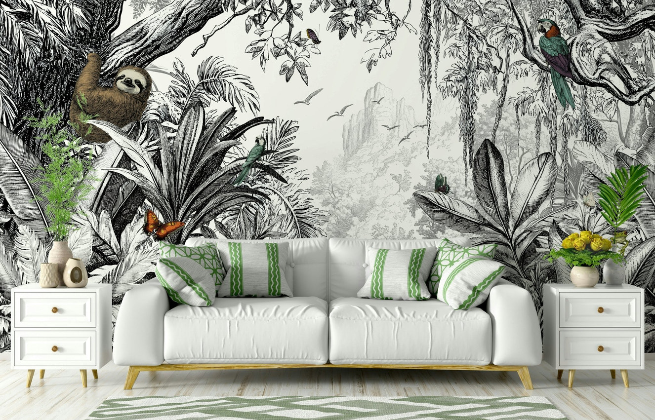 Black and white jungle mural with lush foliage.


