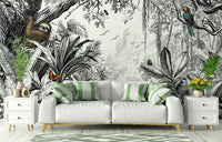 Black and white jungle mural with lush foliage.

