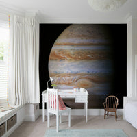 Artistic cosmic scene wall mural for a relaxing lounge atmosphere.