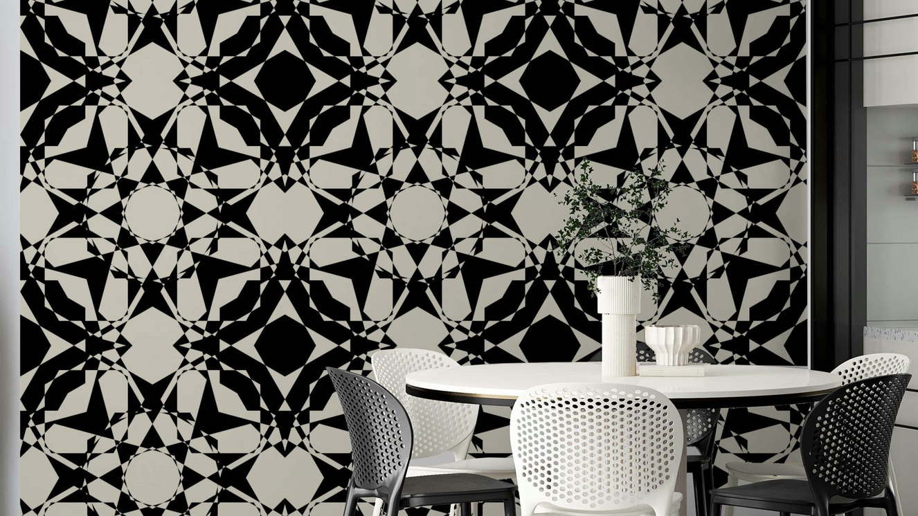 An angled shot of a wall with abstract wallpaper

