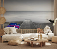 Relaxed sitting room with Kayaks on Pier Wall Mural and minimal coastal view