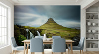 A peaceful mountain and sea mural on decorative wallpaper.
