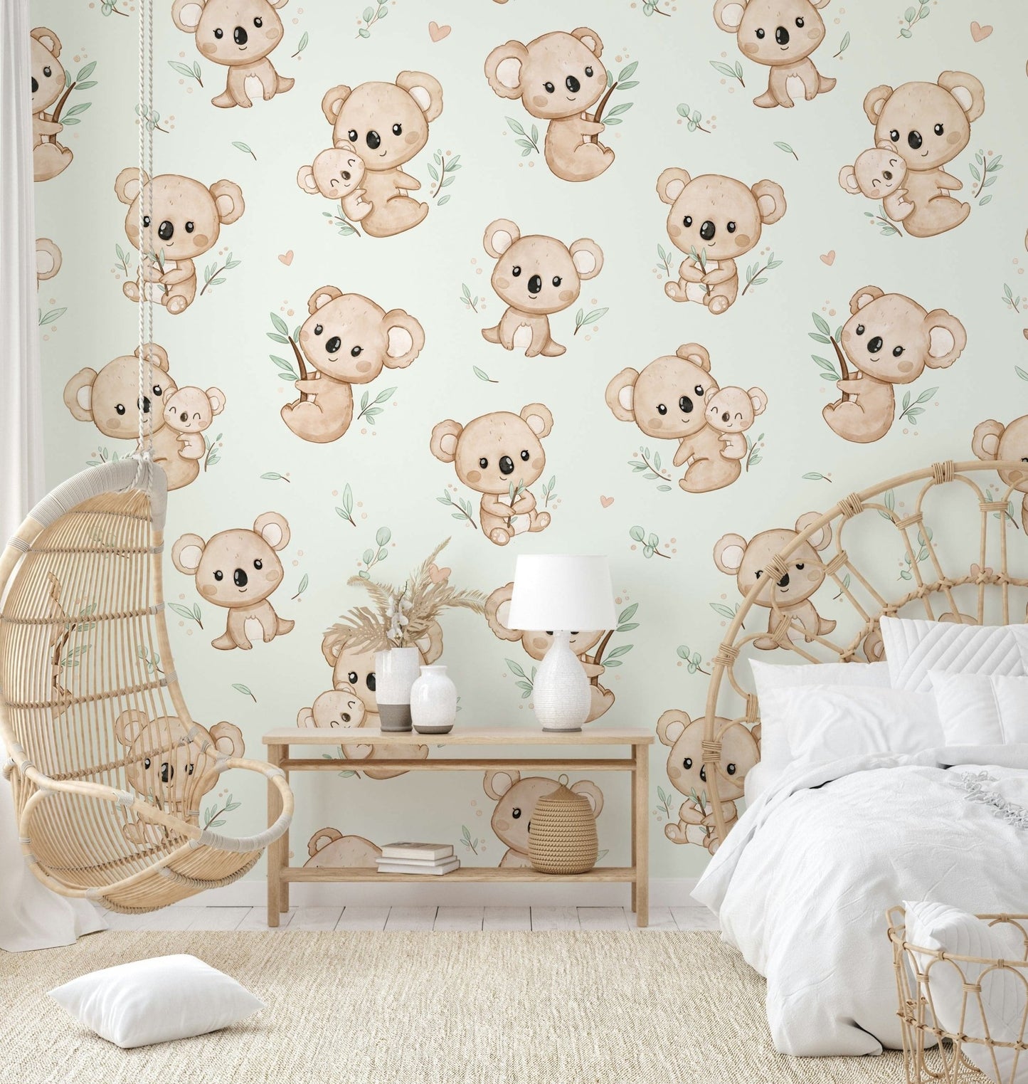 Hand-drawn koalas with hearts and leaves

