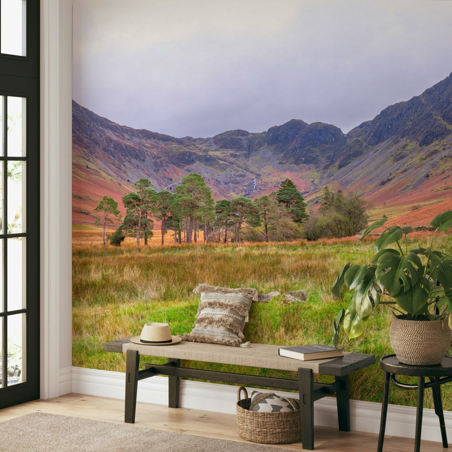 The wallpaper is used as a feature wall in a bedroom.

