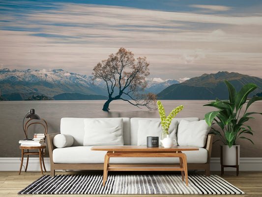 Living room styled with Lake Wanaka tree wall mural and a calm waterside backdrop