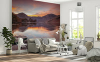 Vibrant landscape wall mural in shades of amber, violet, and deep blue.