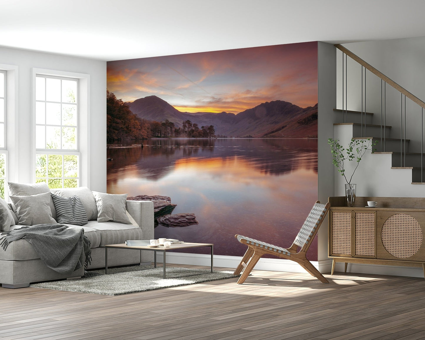 Lakeland Sunrise wall mural with a golden sun rising over a misty lake.