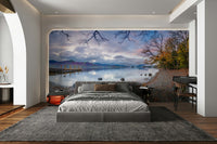 There are some tree branches in the water in the foreground.

