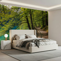 Tranquil lakeside wallpaper for a cozy reading nook or home study.