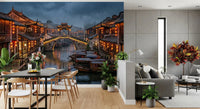 Dining room framed by the moody canal-and-bridge wall mural
GD9509