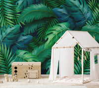 Exotic jungle-themed wallpaper mural with large leafy patterns.