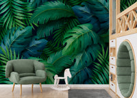 Oversized palm and monstera leaves wallpaper mural.