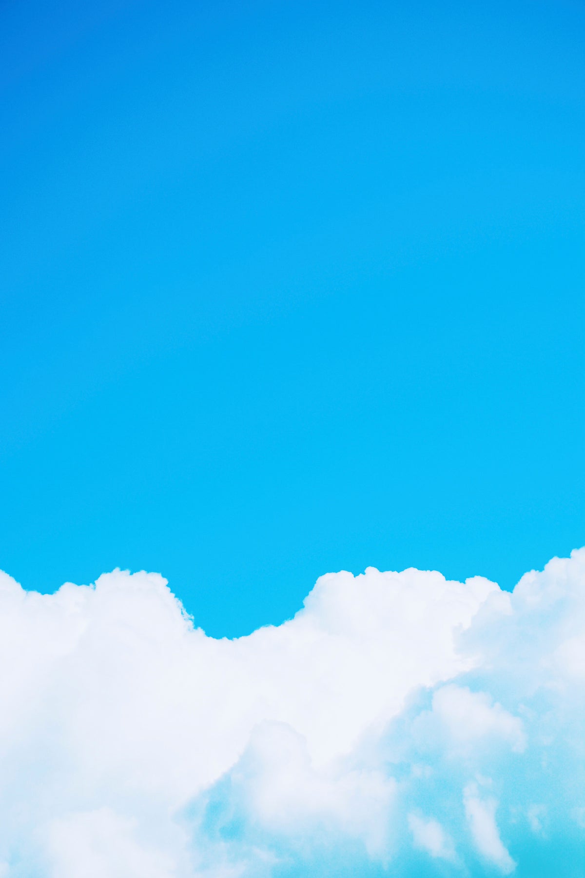 Blue Clouds I Wall Mural in your room — zoomed