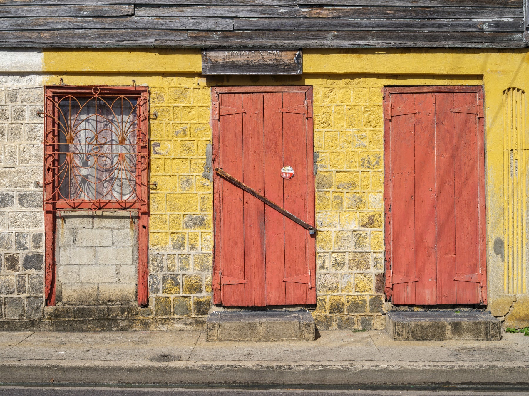 Weathered Brick Wall and Red Doors Wall Mural