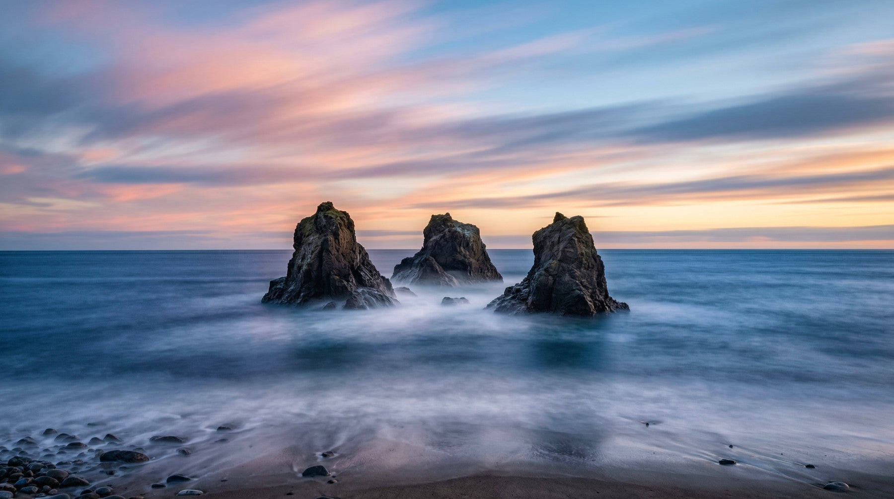 Ethereal Ocean Rocks at Sunset Wall Mural