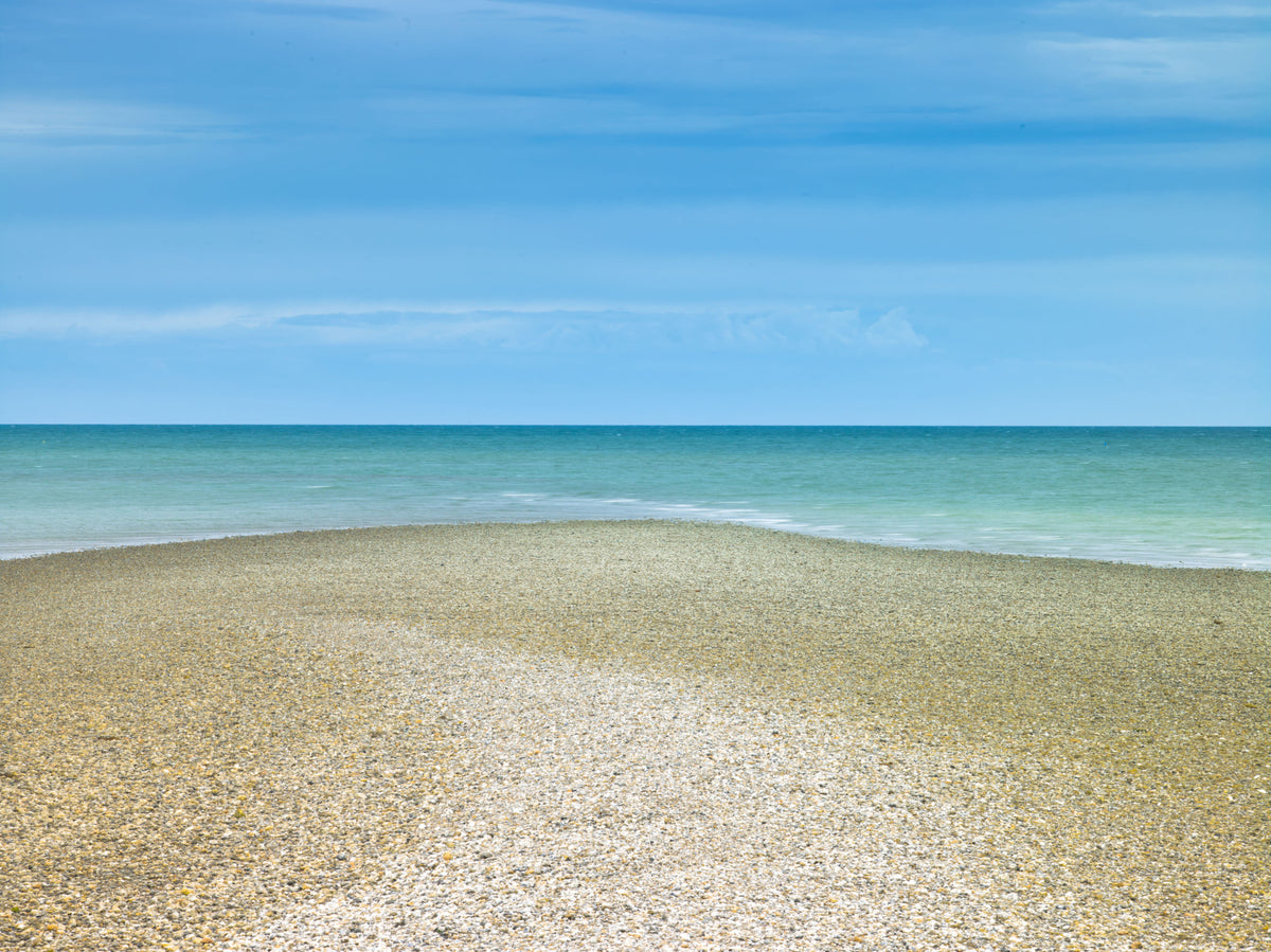 Turquoise Waters Pebble Shoreline Wall Mural in your room — zoomed
