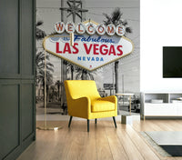 Red and blue Las Vegas sign with grayscale background


