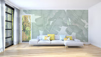 Chic green tropical mural with banana leaves
