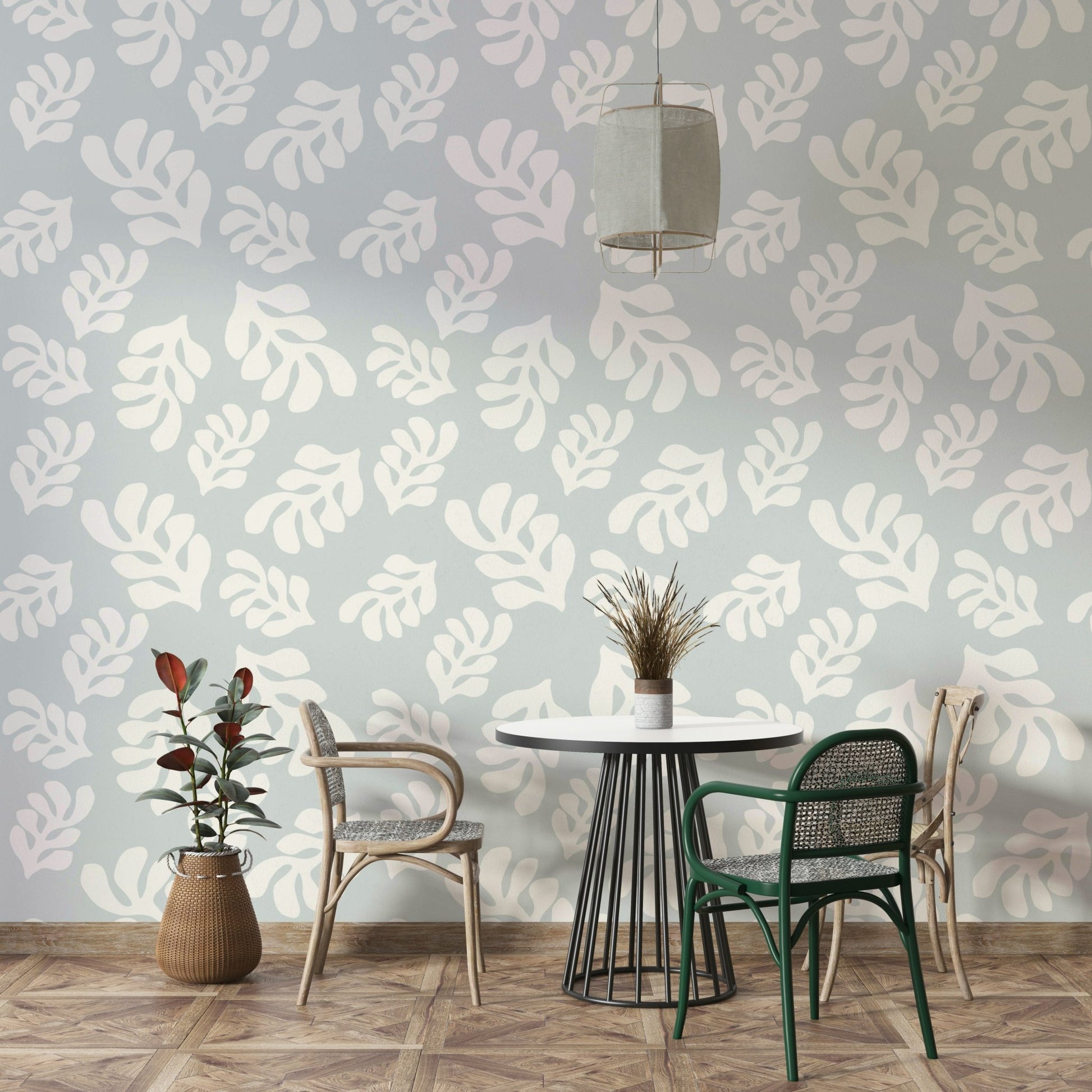 A detailed image of a wallpaper featuring a repeating leaf pattern.

