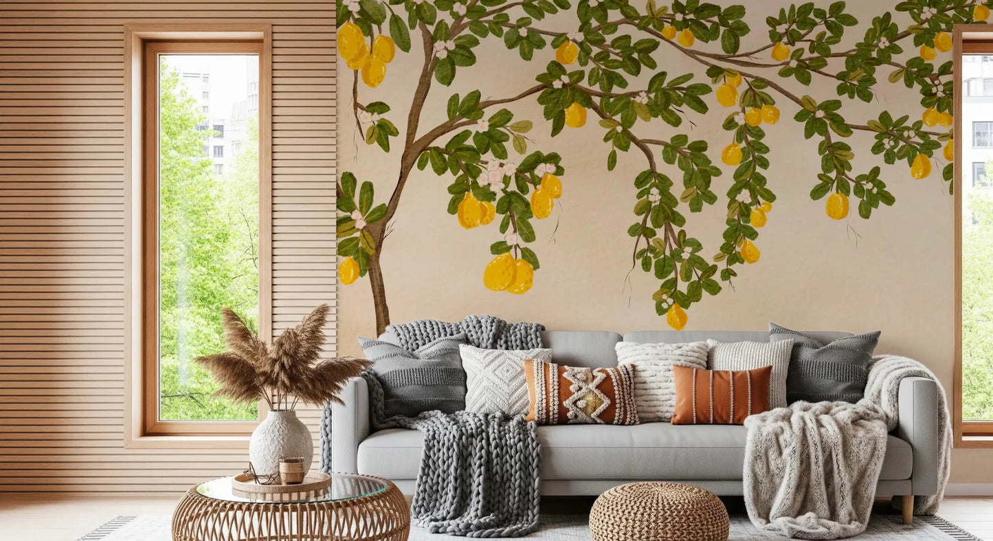 Lemon Grove Bloom Wall Mural behind a grey sofa in a light-filled lounge