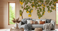 Lemon Grove Bloom Wall Mural behind a grey sofa in a light-filled lounge