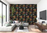 Exotic wildlife wallpaper featuring lemurs hiding among large green leaves.