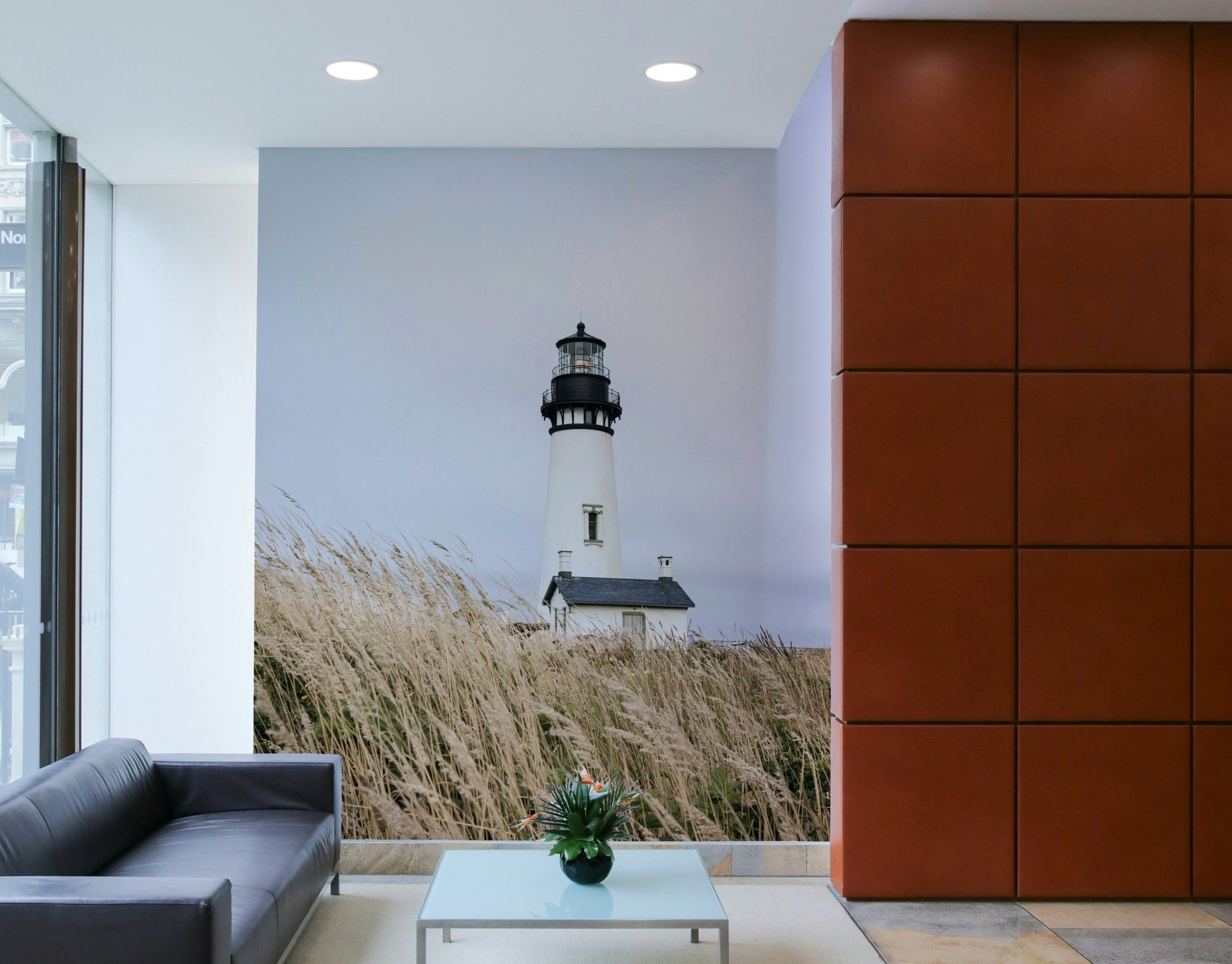 Focus on the lighthouse structure and surrounding landscape.

