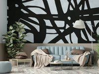 The mural serves as a dramatic backdrop.

