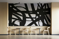 It is installed on an office wall.

