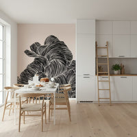 Linear wall mural placed beside a table in a bright modern dining room