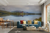 A wall mural of a serene lochside view.

