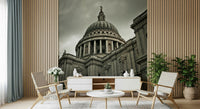 Cityscape wall mural with historical clock tower and bridge.