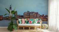 Sophisticated wallpaper with a shimmering river and city architecture.