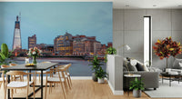 Detailed cityscape wallpaper with twinkling street lights and towers.