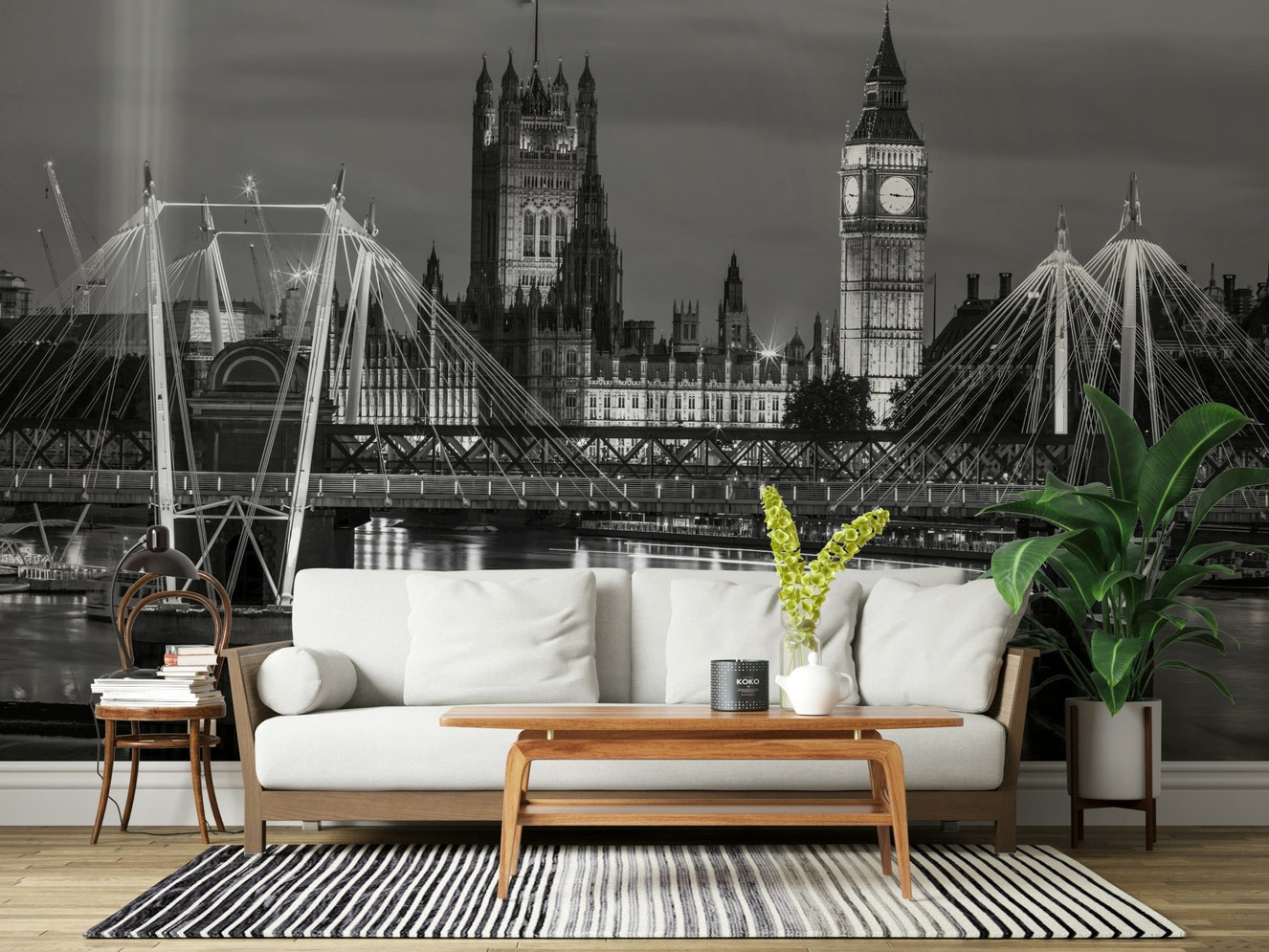 Black and white London skyline mural in a minimalist living room.