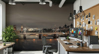 Urban style wall covering for a guest room with neutral linens and industrial lamps.