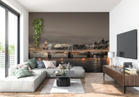 Dark blue cityscape mural used as a backdrop for a modern dining room setup.