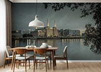 Industrial style wall decor in a sunlit dining area with traditional accents.