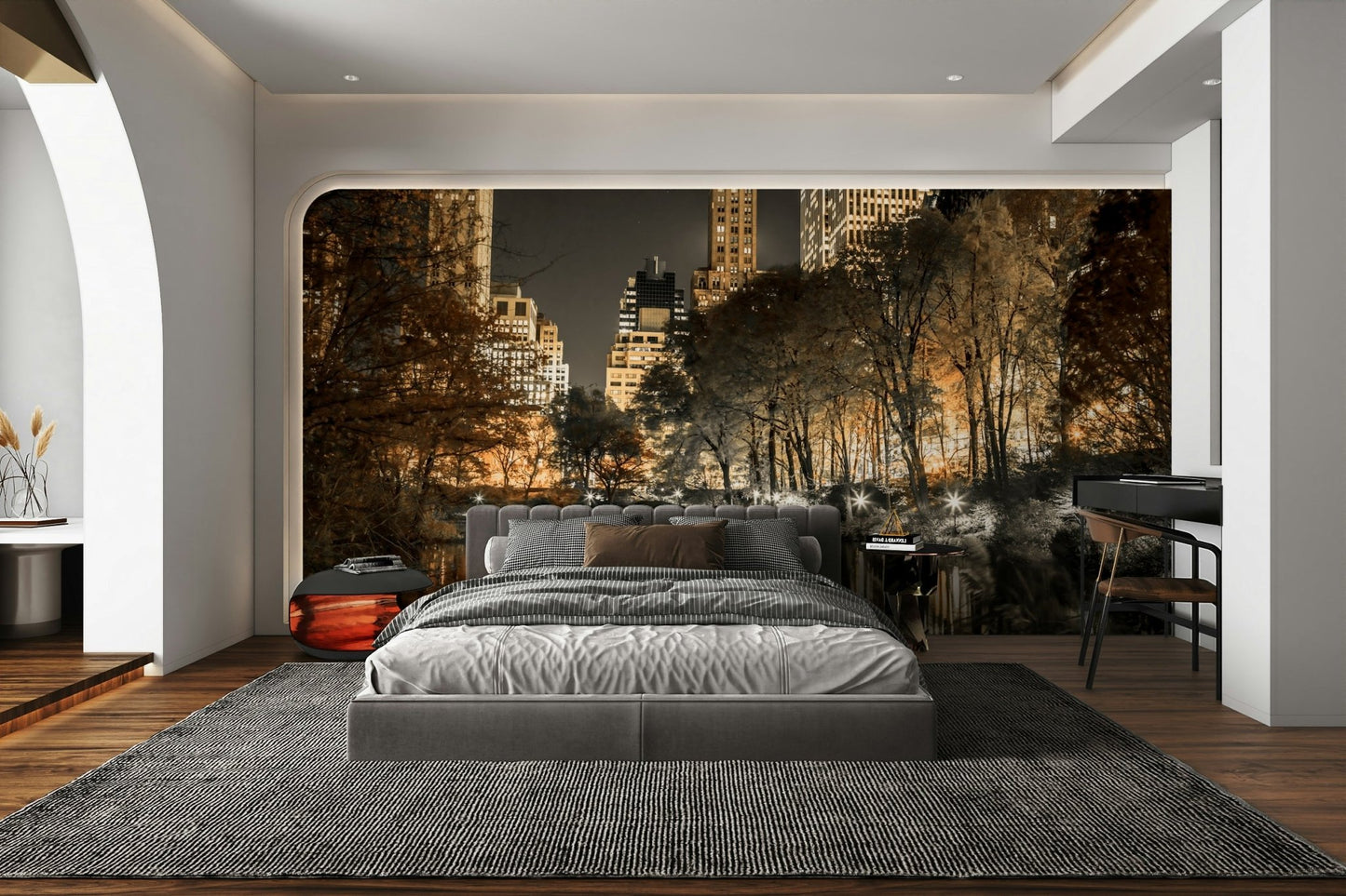 Urban buildings and trees reflected in calm water at night

