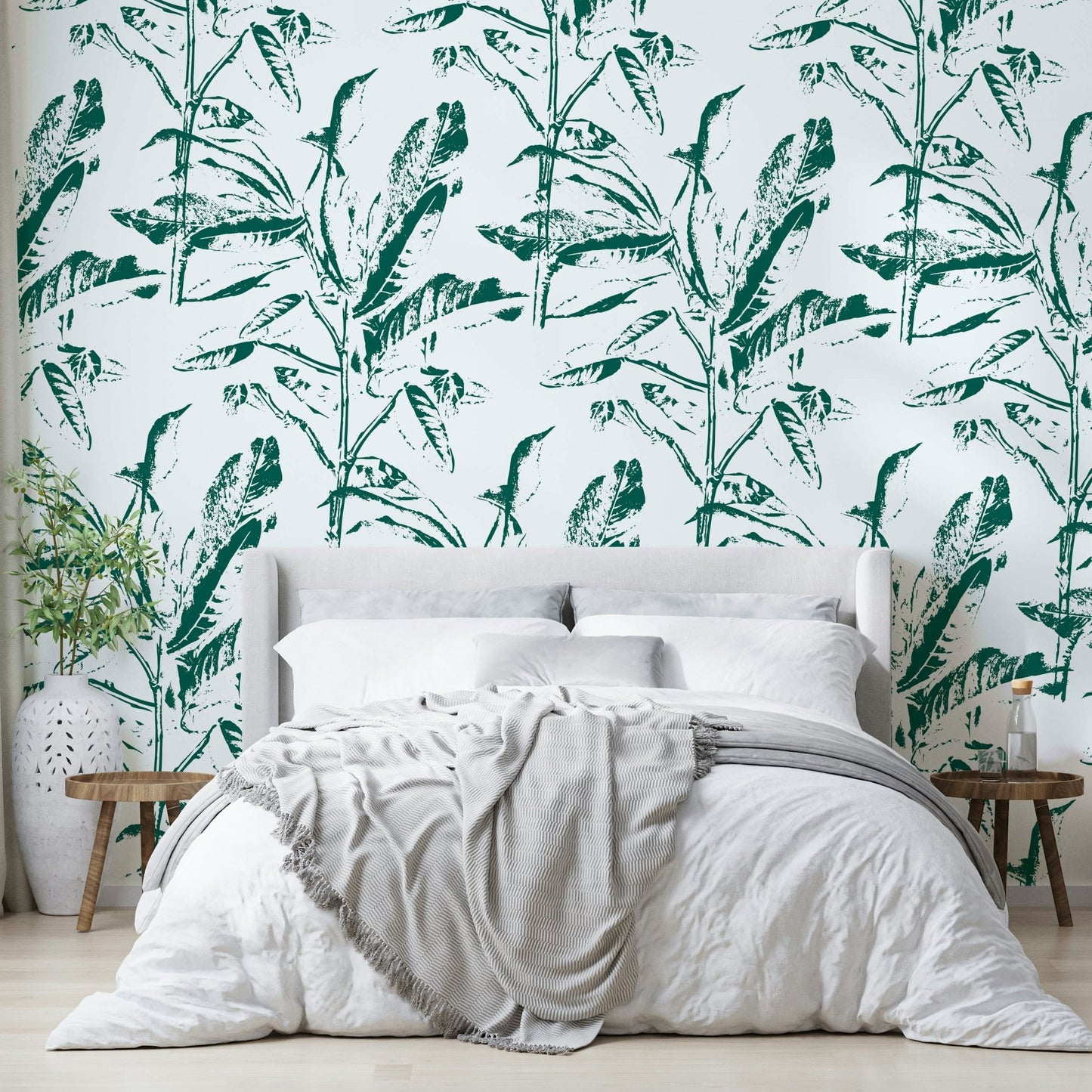 Hand-stamped leaf pattern on wall mural


